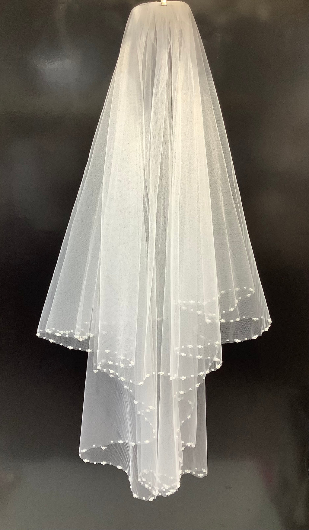 Voile bordure perlée