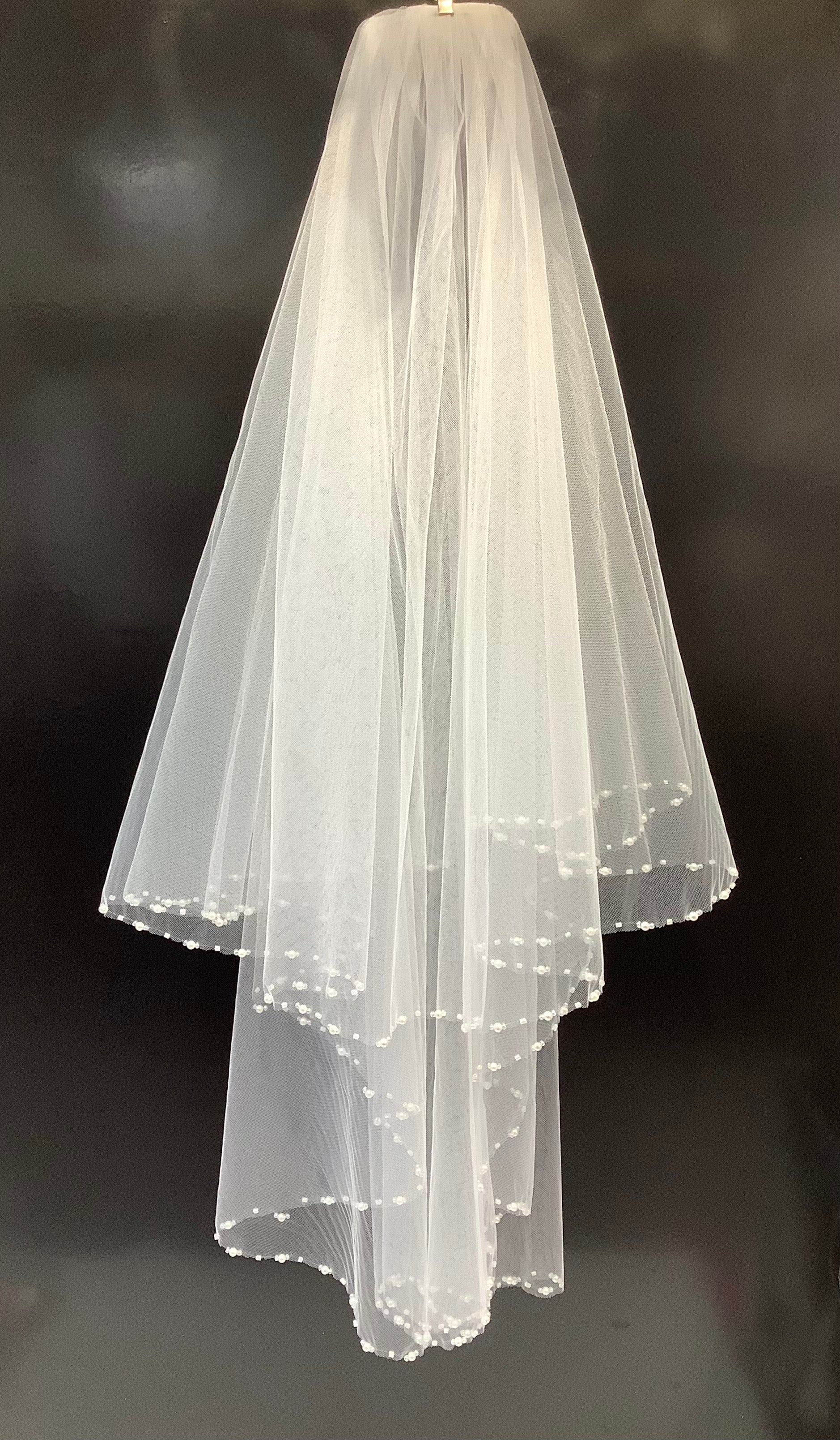 Voile bordure perlée