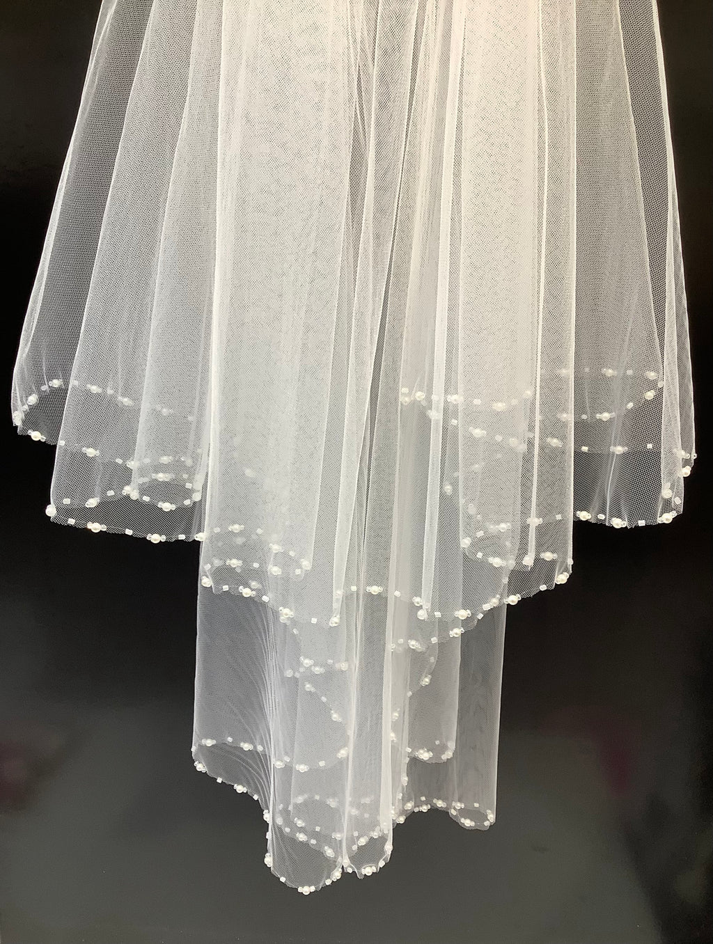Voile bordure perlée