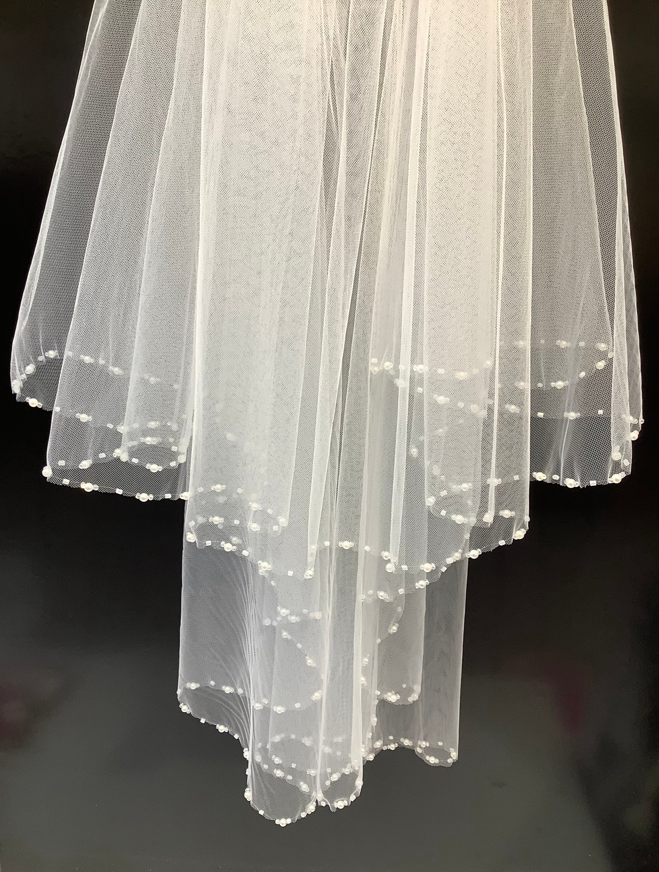 Voile bordure perlée